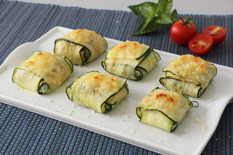 Raviolis de calabacín, queso ricotta y espinacas gratinados con queso